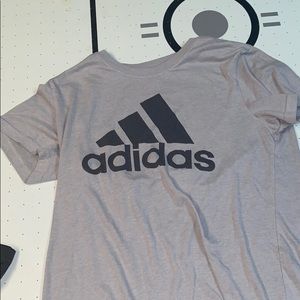 Grey adidas tee.